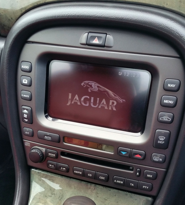 AC upgraded to Climate Control, and touchscreen and navigation system installed.